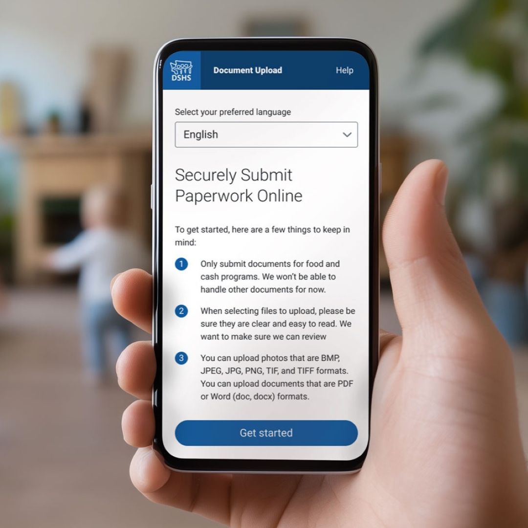 Image of a hand holding a smartphone with the DocUpload website displayed on it.