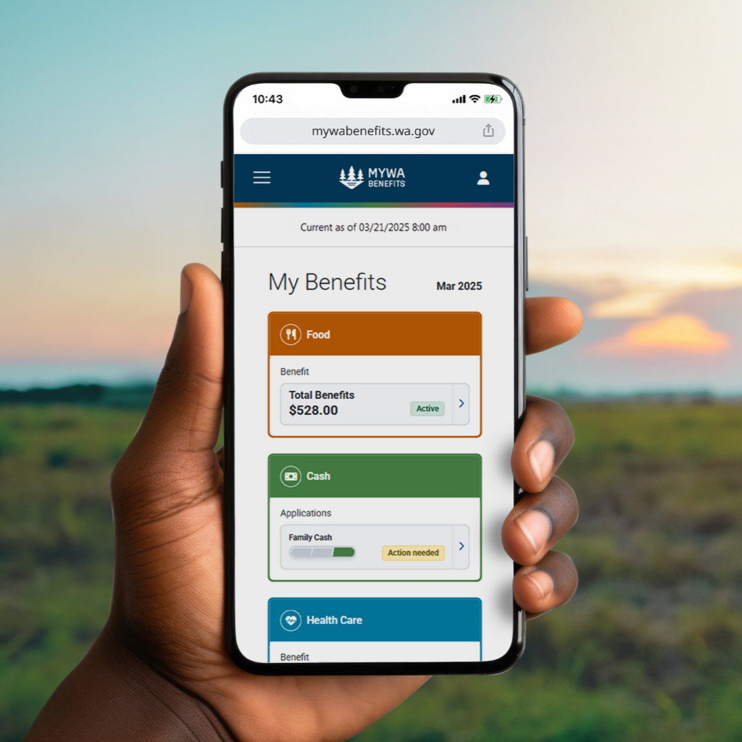 Image of a hand holding a smartphone with the MyWABenefits website displayed on it.