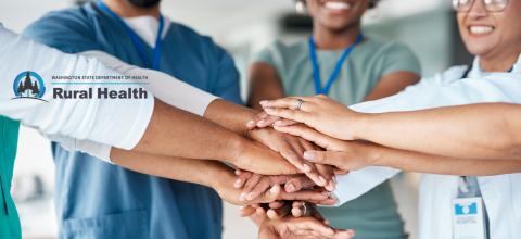 Health care team with hands in center